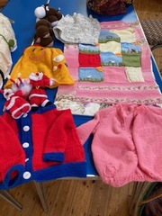 Diane’s knitted toys and clothes